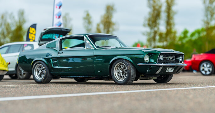 Gothenburg, Sweden - May 11 2025: Green 1967 Ford Mustang Fastback with license plate JPL 415.