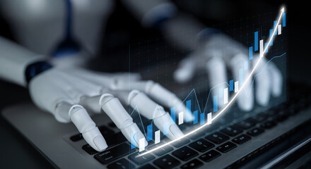 A robotic hand interacting with a laptop keyboard showcases financial data analysis, highlighting...