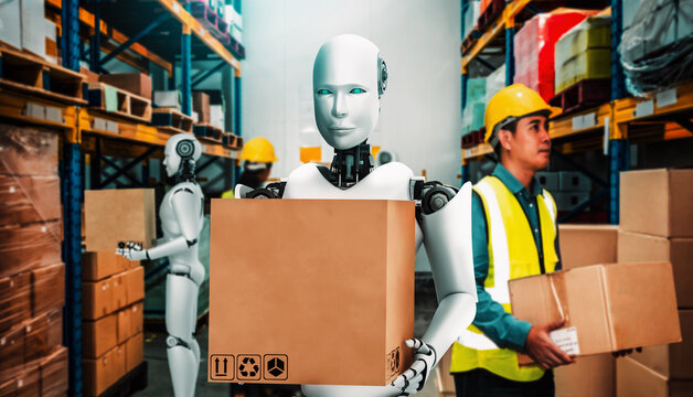 Innovative industry robot working in warehouse together with human worker . Concept of artificial intelligence for industrial revolution and automation manufacturing process .