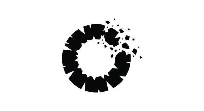 a fragmented circular shape with scattered pieces around it