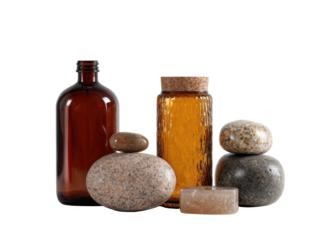 Amber bottles and stones, spa-like still life