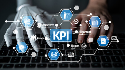 A futuristic scene illustrating a robotic hand and human hand working together on a keyboard, with KPI metrics and business goals visualized for enhanced performance analysis. Tessel