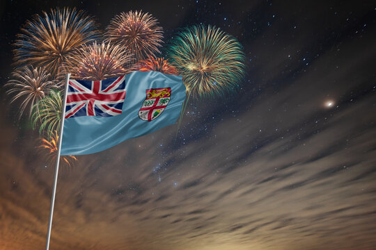 Waving National flag of Fiji and holiday fireworks - Powered by Adobe