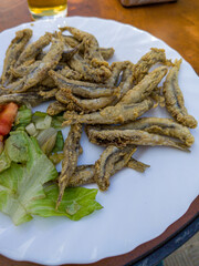 Freshly made fried anchovies, ready to eat