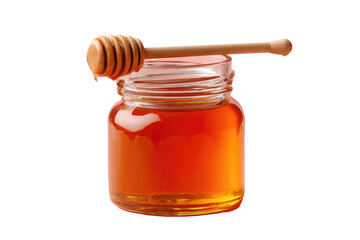 A clear glass jar of amber honey, topped with a wooden honey dipper