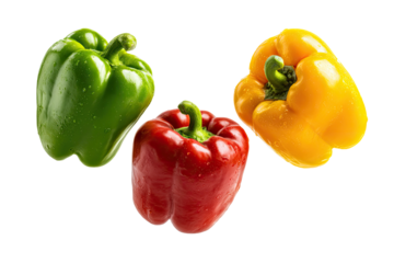 Three bell peppers, green, red, and yellow, arranged in a loose triangular formation against a black background.  Each pepper displays a smooth, glossy surface and distinct color