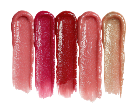 Four swatches of lip gloss in varying shades of pink and red