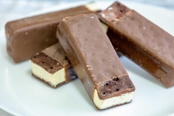 Delicious luxury gourmet ice creams in the shape of an Italian-style sandwich with chocolate topping