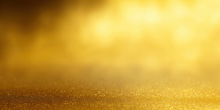A captivating abstract golden background with a soft, sparkling texture and warm glow.