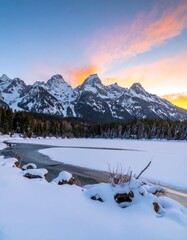 Snowy mountains at winter sunset