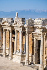 Fototapeta premium Ancient Roman colonnade in Hierapolis in Turkey. Classic architectural ruins from history background use for travel concept.