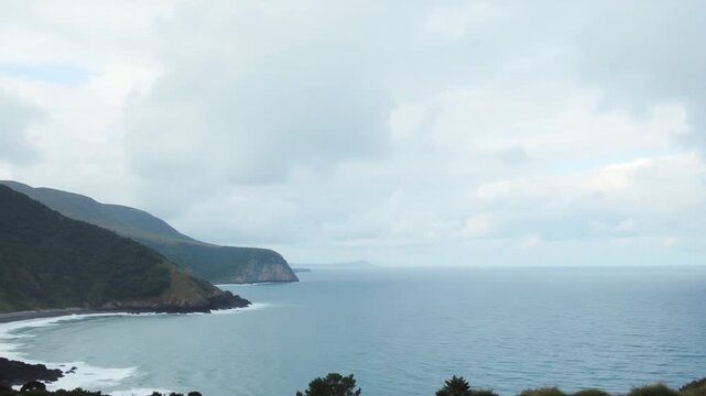 Serene Ocean View Under Partly Cloudy Skies