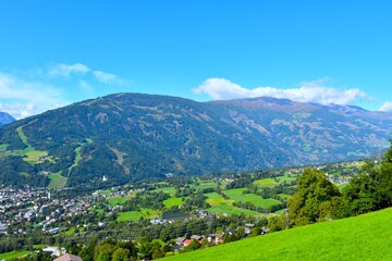 Obraz premium Mountains ain High Tauern range above the countryside at the outskirt of Lienz town in East Tyrol, Austria