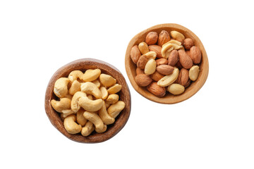 Two wooden bowls of nuts, one with cashews, the other with almonds and cashews