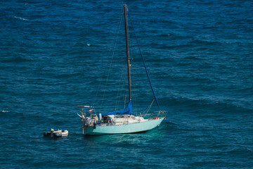 small boat on the open sea