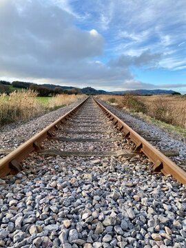 railway tracks into the distance English countryside