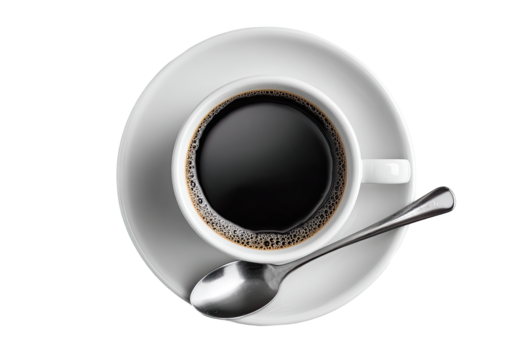 Overhead view of a cup of black coffee on a white saucer, with a silver spoon