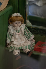 An old ceramic doll from the First Republic era.

