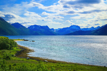 Obraz premium Coastline along Gullesfjord on Hinnoya Island, Vesteralen archipelago, Northern Norway.
