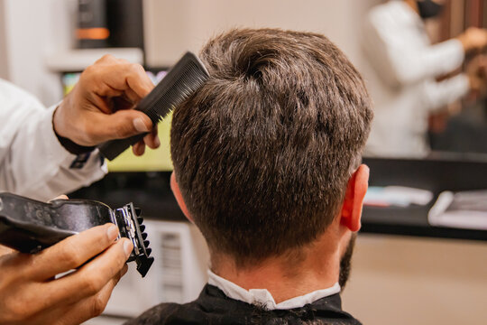 barber makes a hair