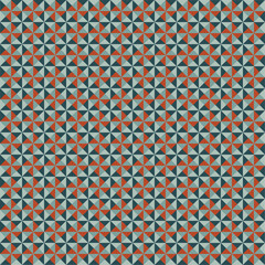 Pattern created from shades of teal and orange triangles