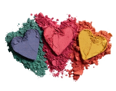 Three heart-shaped eyeshadow compacts, vibrant colors, scattered powder