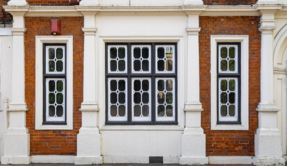 Historic red-brick buildings and chapel dome at Eton College on a clear day