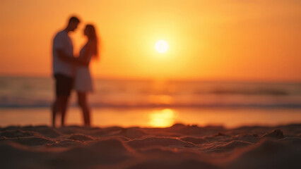 Romantic couple silhouette standing on sandy beach at sunset, warm golden sunlight reflecting on ocean waves, blurred intimate moment with soft focus foreground sand and dreamy summer atmosphere