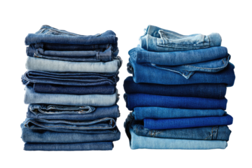 Two stacks of folded denim jeans in varying shades of blue
