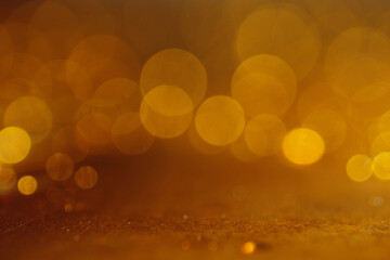 Macro shot of liquid on golden surface