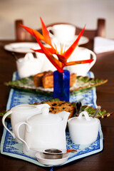 Traditional British afternoon high tea with delicious treats and fine tea.