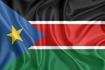 Obraz premium South sudan flag waving in the wind, a symbol of national pride and unity