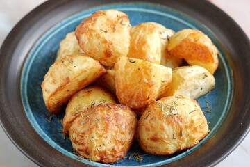 Roast Potatoes cooked in an Air Fryer with dried thyme