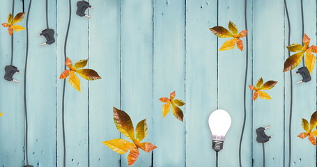 Obraz premium Image of autumn leaves on blue wooden boards