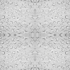 Monochrome water droplets on glass surface