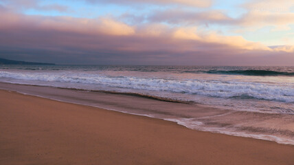 California beach at sunset with sand and ocean © Thad Smidt