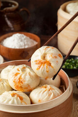 Close-up detail of traditional handmade meat-filled buns, a common nutritious breakfast