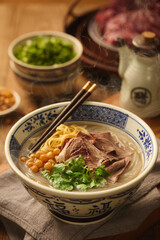 Chef Preparing Traditional Huainan Beef Soup in Restaurant Kitchen(Text translation: 