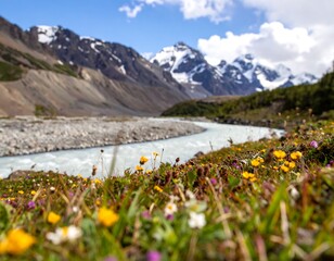Scenic river surrounded by vibrant wildflowers and mountains