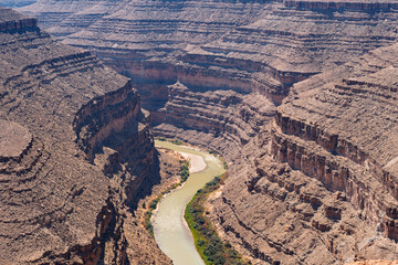 Dramatic Canyon View with Serpentine River and Layered Rock Walls