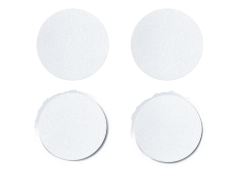 Four blank, circular, white placemats or coasters.  Each has a slightly textured surface and a scalloped edge