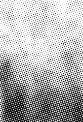 Abstract halftone gradient texture with black dots on white background, perfect for retro comics, vintage posters, print design, and backgrounds.