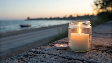 Tranquil candlelight by the shore at dusk with waves and soft lighting