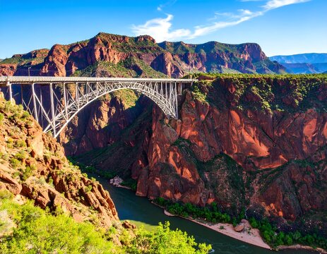 Scenic mountain bridge over a river - Powered by Adobe