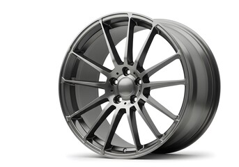 Obraz premium Sleek gunmetal alloy wheel isolated for auto customization projects offering a modern aesthetic and performance car upgrade