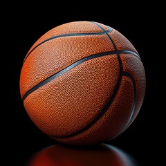 Close-up of an orange basketball with textured surface and black seams on a reflective black background