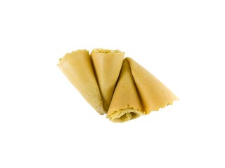 Semprong cake, sapit, sepit, Dutch cake, gapit, kassipi, kapit, Asian egg roll. A waffle or pastry snack originating from Indonesia. Semprong cake isolated on a white background.