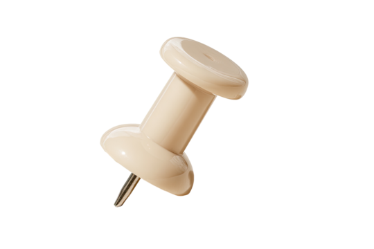 Close-up of a light beige push pin.  Round head, tapered shaft, metal point.  Smooth, glossy surface.  Isolated against black background
