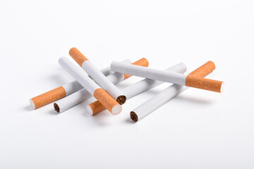Pile of cigarettes isolated on white background