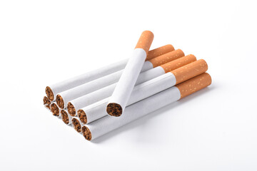 Pile of cigarettes with filters isolated on white background